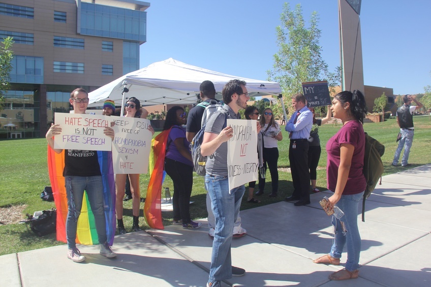 Members of the LGBT Student Association protest Sept. 14 against a scheduled speech by Wayne Tew, former CEO of Clark County Credit Union, Chairman for the World Congress of Families. 