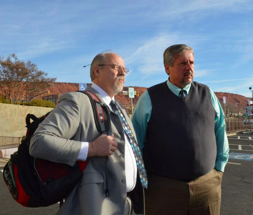 Attorney Aaron Prisbrey and Varlo Davenport, a former tenured theater professor, stand outside the Washington County Justice Court Feb. 10. Davenport was charged with assault. Photo by Breanna Opdahl.