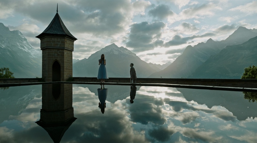 Lockhart (Dane DeHaan) meets a strange, young patient named Hannah (Mia Goth) at an idyllic spa located in the Swiss Alps in a scene from "A Cure for Wellness." Courtesy of 20th Century Fox.