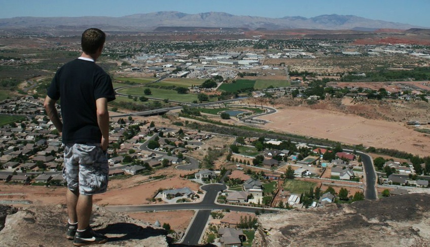Braden White, a freshman Pre-Engineering major from Spanish Fork takes in the view from the top of Shinob Kibe. The trailhead can be found just north of Shinob Kibe, at the end of Paiute Drive.