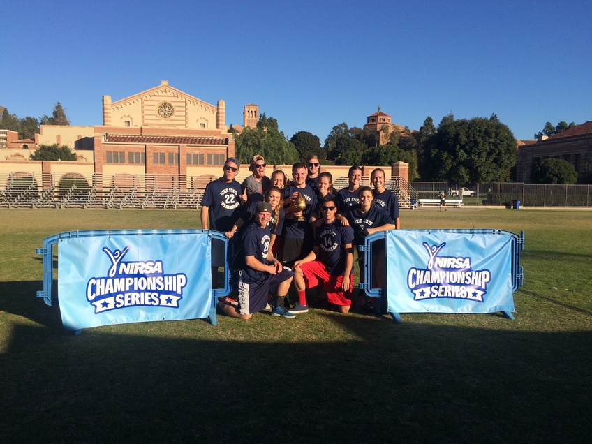The Gremlins, an intramural coed flag football team, pose after becoming regional champions. Photo by: Macy Uruttia